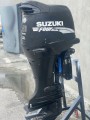 USED 2003 Suzuki 140 HP Four Stroke 25" Shaft Outboard Motor For Sale